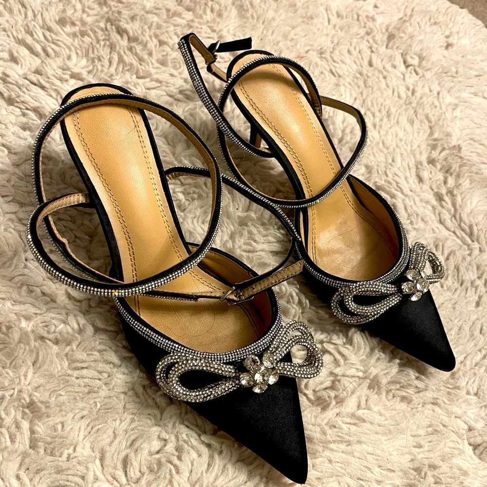 Black and Silver Slingback Heels with Crystal Embellishments.